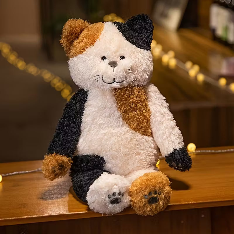 Cuddling Cat Soft Toy™